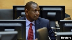 William Ruto akiwa kwenye chumba cha mahakama ya ICC huko The Hague, Uholanzi, May 14, 2013. 