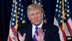 President Donald Trump speaks during a news conference at his Trump National Golf Club in Bedminster, N.J., Saturday, Aug. 15. (AP Photo/Susan Walsh)