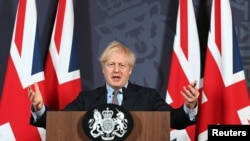英国首相约翰逊2020年12月24日在唐宁街召开记者会 (路透社图片）