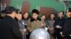 김정은 북한 국방위원회 제1위원장이 핵무기 연구 부문 과학자, 기술자들을 만나 핵무기 병기화 사업을 지도하는 모습을 지난 2016년 3월 조선중앙통신이 보도했다. 사진 아래쪽에 핵탄두 기폭장치 추정 물체가 보인다. 