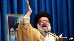 FILE - Iranian senior cleric Ahmad Khatami delivers his sermon during Friday prayers, in Tehran, Iran, Jan. 5, 2018.