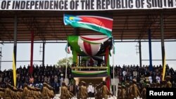 Members of the Sudan People's Liberation Army (SPLA) march during celebrations to mark the first anniversary of South Sudan's independence in Juba, July 9, 2012. 