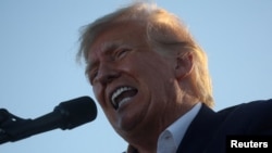 FILE PHOTO: Former U.S. President Donald Trump holds a campaign rally in Waco, Texas