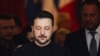 Ukraine's President Volodymyr Zelensky reacts as he leaves after attending a summit held at Lancaster House in central London on March 2, 2025.