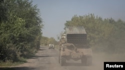 Украинская установка БМ-21 «Град» близ линии фронта в Запорожской области. Август 2023 г. (архивное фото)
