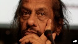 FILE - Rajendra Kumar Pachauri, Chairman of the Inter- governmental Panel on Climate Change, IPCC, listens during a briefing at the UN Climate Summit in Copenhagen.