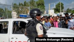 Un agent de la police à Port-au-Prince, Haïti, le 9 juillet 2021.