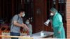 Taiwan, Once an Icon for COVID Control, Grapples Now with First Serious Outbreak 