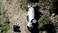 The vehicle of golfer Tiger Woods, who was rushed to a hospital after suffering multiple injuries, lies on its side after a single-vehicle accident in Los Angeles, California, in a still image from video taken Feb. 23, 2021. (KNBC via Reuters)