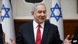 Israeli Prime Minister Benjamin Netanyahu chairs the weekly cabinet meeting in Jerusalem, March. 8, 2020.