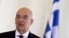 FILE - Greek Foreign Minister Nikos Dendias speaks during a news conference at the Foreign Ministry in Athens, Greece, Oct. 26, 2020.