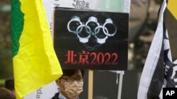 資料照：人權組織活動人士在聯合國國際人權日聚集在台北呼籲抵制北京冬奧會。 （2021年12月10日）