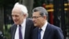 Former Goldman Sachs Group Inc. board member Rajat Gupta, right, and lawyer Gary Naftalis arrive at Manhattan Federal Court in New York, June 14, 2012.