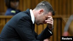 FILE - Olympian Oscar Pistorius attends his sentencing for the murder of Reeva Steenkamp at Pretoria High Court, South Africa, June 13, 2016.