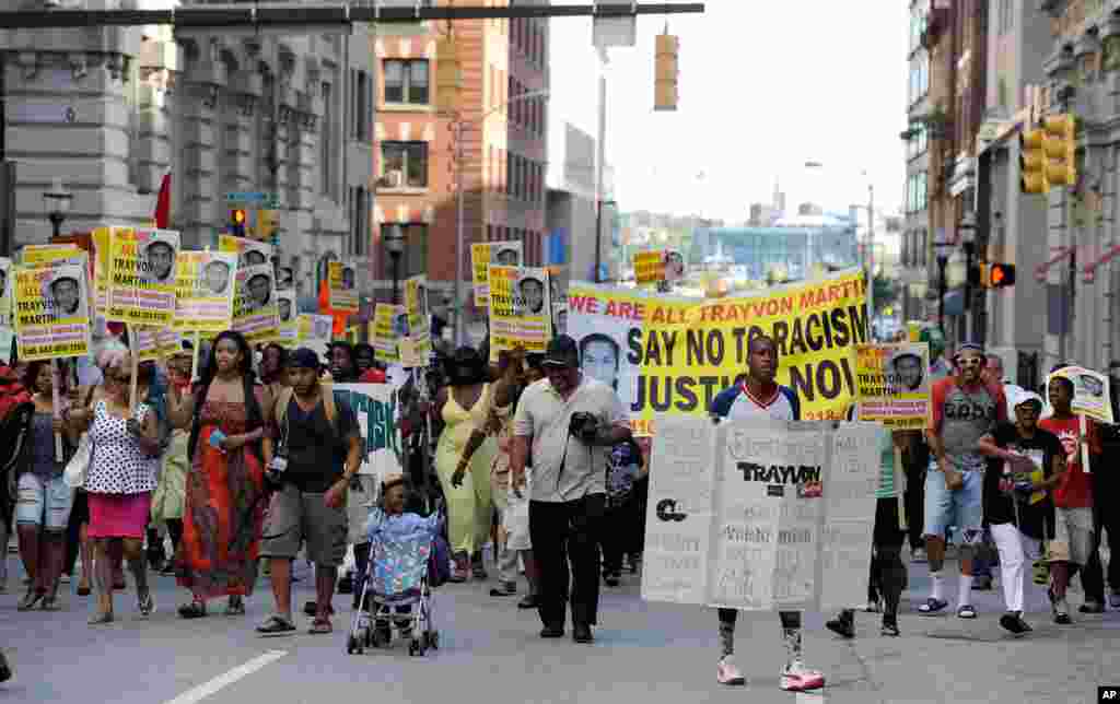 Protesters march during a demonstration in reaction to the acquittal of neighborhood watch volunteer George Zimmerman, Baltimore, Maryland, July 15, 2013.