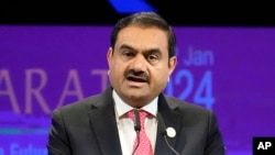 FILE - India's Adani Group Chairman Gautam Adani addresses the Vibrant Gujarat Global Summit in Gandhinagar, India, Jan.10, 2024.