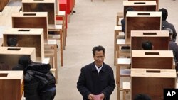 图为乌坎村党总支书记林祖銮3月3日投票之前