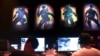 FILE - Gamers play Call of Duty: Black Ops 4 at a community reveal event in Hawthorne, California, May 17, 2018.