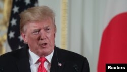 特朗普總統星期一在東京與日本首相安倍晉三舉行聯合記者會時。