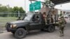 Les rebelles du M23 escortent les FDLR jusqu'à la frontière rwandaise pour être rapatriés après leur capture à Goma, selon le M23.