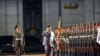 Gambar ini diambil pada 10 Oktober 2020 dan dirilis dari Kantor Berita Pusat Korea (KCNA) resmi Korea Utara pada 11 Oktober 2020 menunjukkan pemimpin Korea Utara Kim Jong Un (tengah) sedang memeriksa pasukan. (Foto: AFP)