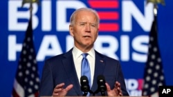 Democratic presidential candidate former Vice President Joe Biden speaks Friday, Nov. 6, 2020, in Wilmington, Del. (AP Photo/Carolyn Kaster)