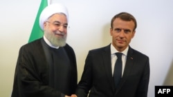 Emmanuel Macron avec son homologue iranien Hassan Rohani lors de la 73e session des Nations unies, à New York, le 25 septembre 2018.