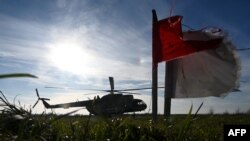 A Mi-8 military helicopter takes off during a training flight at an undisclosed location in Lviv region on November 7, 2024, amid the Russian invasion of Ukraine.