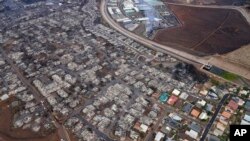 La destrucción causada por los incendios en Lahaina, Hawái, se observa en esta foto aérea del 10 de agosto de 2023.