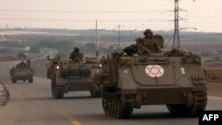 Izraelske oklopne jedinice idu ka Pojasu Gaze (Foto: AFP/Menahem Kahana)
