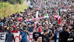 Migranti u karavanu prema američkoj granici u Tapačuli, državi Čiapas, Meksiko, 24. decembra 2023. godine. (Foto: AFP)
