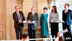 Members of the Nobel Committee for Literature (L-R) Chairman Anders Olsson, Per Wastberg, Rebecka Karde, Mikaela Blomqvist and Henrik Petersen announce the winners of the 2018 and 2019 Nobel Prize in Literature at the Swedish Academy in Stockholm,…