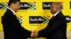 South African President Jacob Zuma (R) shakes hand with visiting Chinese President Xi Jinping after their joint media conference at Union Building Pretoria, South Africa, Dec. 2, 2015.
