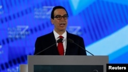 FILE - U.S. Secretary of the Treasury Steven Mnuchin speaks during the Future Investment Initiative conference in Riyadh, Saudi Arabia, Oct. 25, 2017. 