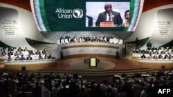 Chairperson of the African Union Commission Moussa Faki Mahamat delivers a speech during the African Union (AU) summit at the Palais des Congres in Niamey, Niger, July 7, 2019. Updated July 7, 5:20 pm 