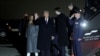 U.S. President-elect Donald Trump, center, waves as he arrives at Washington Dulles International Airport in the state of Virginia, Jan. 18, 2025.