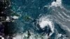 Imagen satelital de la Administración Nacional Oceánica y Atmosférica (NOAA) muestra una tormenta tropical al este de Puerto Rico en el Caribe, a las 7:50 am EST, el 10 de agosto de 2021.