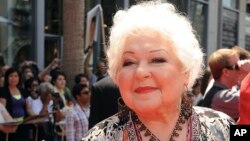 FILE - Estelle Harris arrives at the world premiere of "Toy Story 3," June 13, 2010, at The El Capitan Theater in Los Angeles.