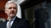 FILE - WikiLeaks founder Julian Assange makes a speech from the balcony of the Ecuadorian Embassy, in central London, Britain, Feb. 5, 2016. 
