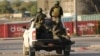 Tentara Haiti berpatroli di luar Bandara Internasional Toussaint Louverture menyusul baku tembak dengan geng bersenjata sementara pemerintah mengumumkan keadaan darurat di Port-au-Prince, Haiti, 4 Maret 2024. 