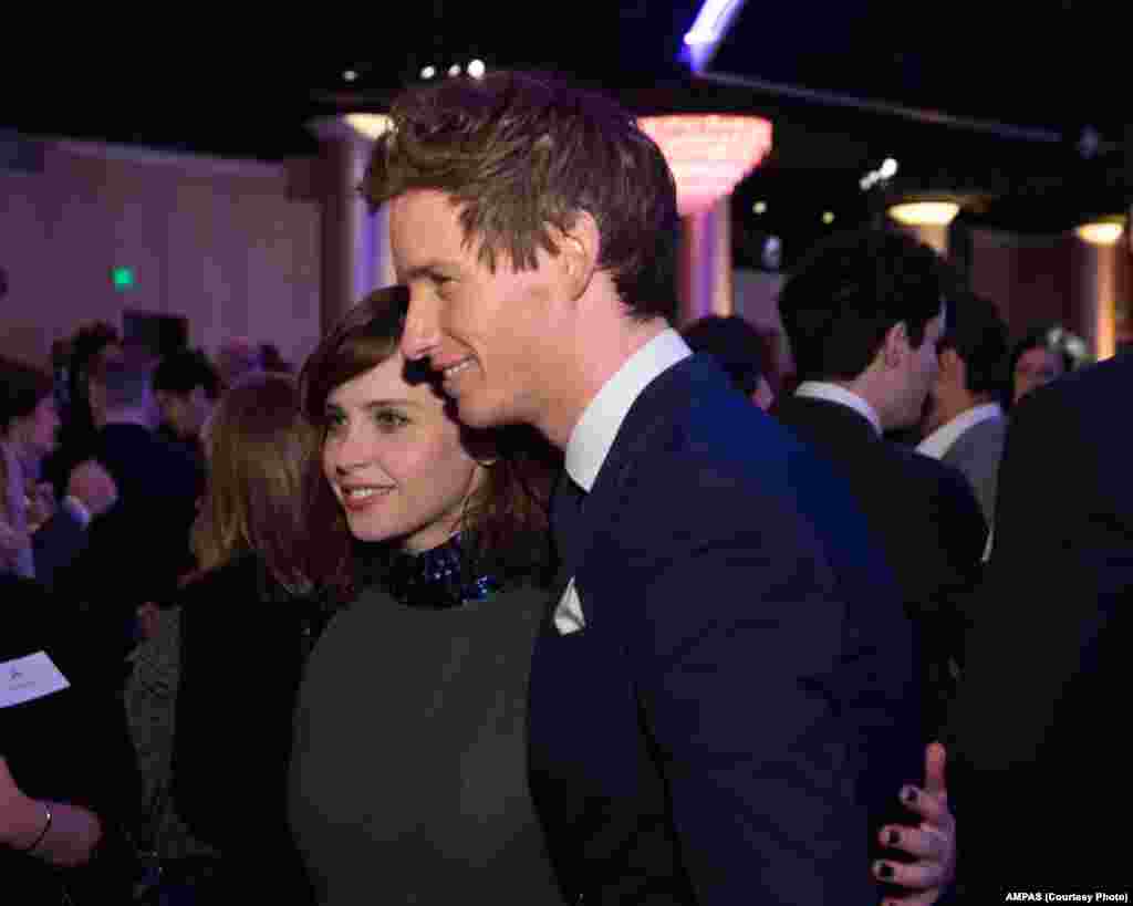 Felicity Jones (left) and Eddie Redmayne at the Oscar® Nominees Luncheon in Beverly Hills, Feb. 2, 2015.