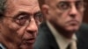 Amr Moussa (L), chairman of the committee to amend the country's constitution speaks at a news conference, next to media spokesperson Mohamed Salmawy, at the Shura Council in Cairo, Sept. 22, 2013.