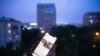 A user holds a smartphone with an opened Facebook page in Moscow, Russia, Thursday, June 10, 2021. Russian authorities have ordered Facebook and messaging app Telegram to pay steep fines for failing to remove banned content. The move could be part…