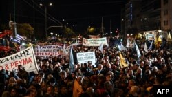 Greek farmers gather outside the Greek Parliament in Athens on Feb. 20, 2024 during a protest to demand financial aid, escalating a four-week showdown with a government that says it has no more funds to help.