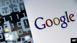 This March 23, 2010, file photo shows the Google logo at the Google headquarters in Brussels. (AP Photo/Virginia Mayo, File)