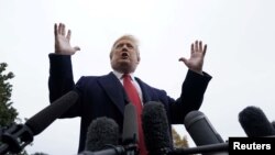 Presiden AS Donald Trump berbicara kepada para wartawan dari Halaman Selatan Gedung Putih di Washington, 9 November 2018.