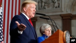 Presiden AS Donald Trump berbicara dalam konferensi pers bersama Perdana Menteri Theresa May di London, 4 Juni 2019.
