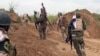 Iraqi Shi'ite fighters from the Furqat al-Abbas brigades take up their position during an operation to retake the town of al-Bashir, near Kirkuk, from the Islamic State group, April 10, 2016.