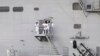 Seorang personel Angkatan Laut Amerika Serikat di pintu kapal USS Peleliu, kapal penyerang amfibi yang sedang berlabuh di Subic Bay, bekas pangkalan AL AS, di Olongapo, barat laut Manila, 21 Oktober 2014. 