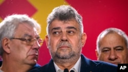 Rumunski premijer Marsel Čolaku, iz Socijaldemokratske partije (PSD), govori nakon izlaznih anketa na parlamentarnim izborima, Bukurešt, Rumunija, 1. decembar, 2024.(Foto: AP/Alexandru Dobre)
